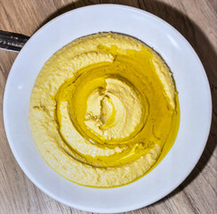 Creamy Hummus Dip with Olive Oil for Premium Appetizer Food Object and Middle Eastern Cuisine