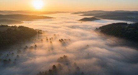 Fototapeta premium Aerial View of Sunrise Over Foggy Landscape