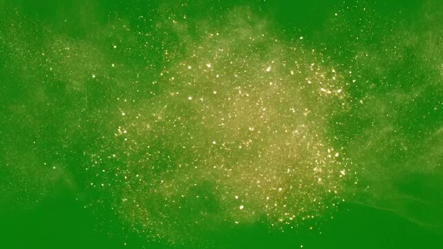 Golden dust particles suspended in air with abstract gold dust patterns creating effect green screen gold dust shimmer style