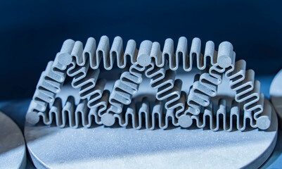 3d printed metal cube showing internal structure