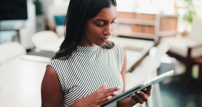 Creative, woman and typing with tablet in office for research, proofreading and update draft. Female person, digital and editor feedback on magazine, story submission and information for publication