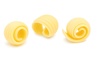 Smooth curling butter swirls showcasing delicate texture creamy richness artistic shape and elegant culinary styling ideal for gourmet presentations bakery visuals and premium food photography