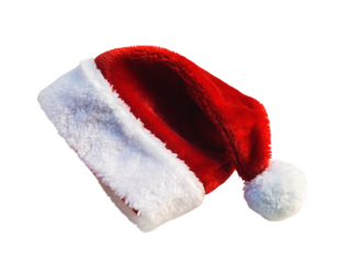 Red Santa Hat with White Fur Trim and Pom Isolated on Black christmas holiday