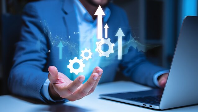 Businessman holding glowing gears and upward arrows representing business growth and success - Powered by Adobe