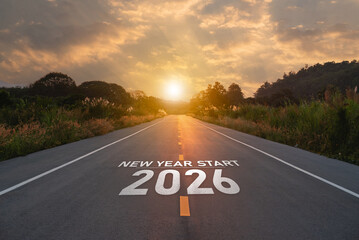 New Year Start 2026. Serene Road Leading into Sunset with Clear Sky and Greenery, Marked with 2026 Start for Future Journey and New Beginnings in Scenic Landscape