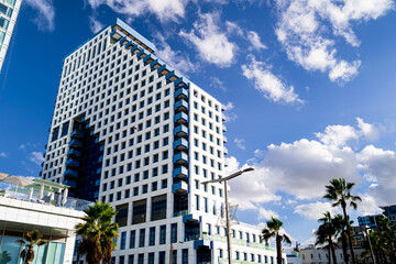 Fototapeta premium Futuristic architecture against a blue sky in Tel Aviv, Israel.
