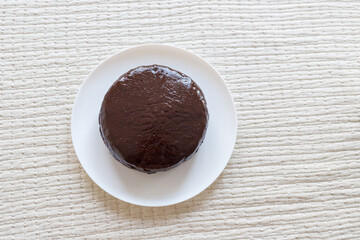 Chocolate cake Prague on the white background. Traditional Sacher cake. Ready to eat.