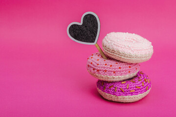 Handmade crocheted donuts with shiny beads. Festive Valentines or Mothers Day, greeting card