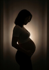 Pregnant woman in silhouette