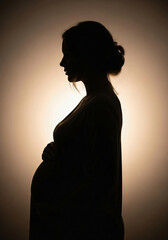 Pregnant woman in silhouette