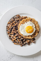 Savory fried rice topped with umami Shimeji mushrooms and golden sunny egg