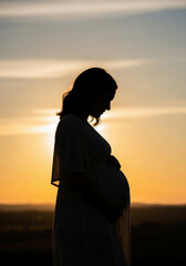 Pregnant woman in silhouette