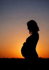 Pregnant woman in silhouette