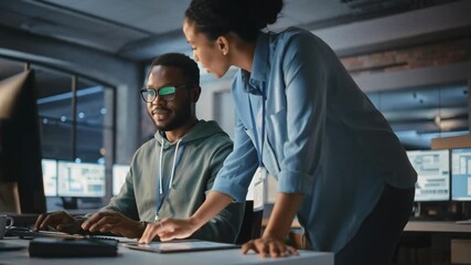 Collaborative teamwork in a modern office environment with diverse professionals using technology - Powered by Adobe