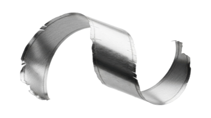 Close-up shot of a metallic, curved, and twisted metal strip with a reflective surface.