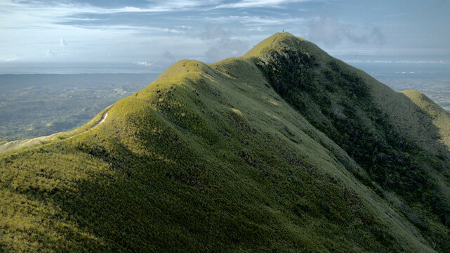 Aerial view of the majestic Cerro Pajita peak rising with green and yellowish hues against the distant horizon, El Valle de Ant&Atilde;&sup3;n, Cocl&Atilde;&copy; Province, Panama.