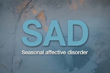 Seasonal Affective Disorder SAD awareness poster with blue letters on textured background, winter depression mental health campaign