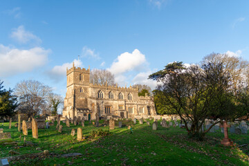 Holy Cross Church in Seend, Wiltshire. Dating from about 1450 - Wide with graveyard
