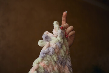 Knitting by fingers concept