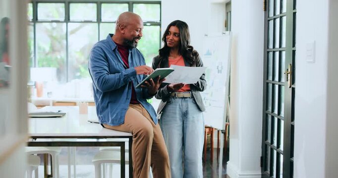 Coaching, documents and tablet with designer people in office for internship or project management. App, meeting or paperwork with mentor man and woman in workplace for conversation or update