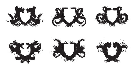 Abstract grunge shields collection featuring various artistic brushstroke designs with a powerful, dynamic, and decorative heraldic aesthetic.