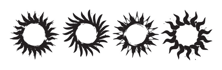 Four stylized sun frames with artistic brush stroke rays offer a versatile and decorative design element for various creative projects and graphic applications.