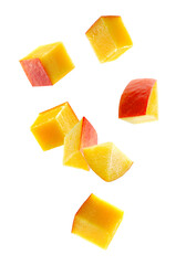 Cubic and triangular mango pieces form an unusual figure look like a loop. Isolated on white