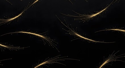Abstract golden sparks and light trails on a dark background