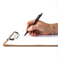 Hand writing on clipboard with pen