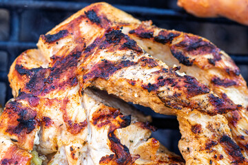 Pork chops, steak, sausages on barbecue grill