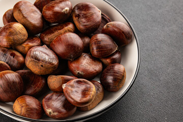 Edible chestnuts delicious treat tasty snack fresh gourmet food background on table rustic food top view copy space