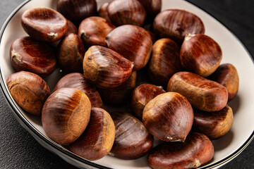 Edible chestnuts delicious treat tasty snack fresh gourmet food background on table rustic food top view copy space