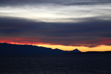 Colorful sunset or sunrise sky over the sea.