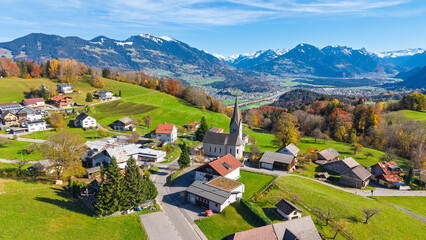 The village of Gurtis with snow by Nenzing, Walgau Valley, State of Vorarlberg, Austria, Drone Photography