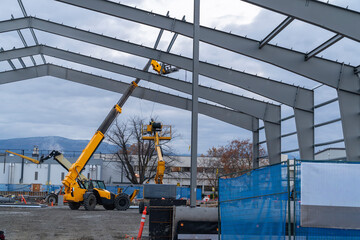 Construction site with steel framed building being erected © Hamilton Productions