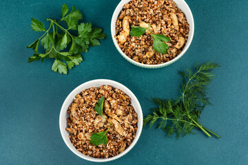 Cooked buckwheat porridge with meat stew.