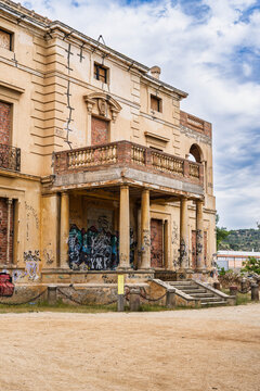 The abandoned neoclassical Torre Arnus mansion covered in graffiti in Can Solei i Ca l'Arnus park. Badalona, Spain
