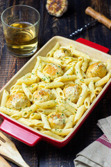 Pasta with chicken meatballs in a creamy sauce. Italian cuisine. Recipe.