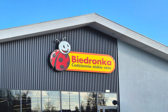Logo and sign of Biedronka (Ladybug) discount supermarket.