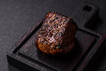 Grilled or barbecued beef steak, a fillet of meat cooked for dinner. Beef steak