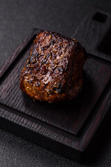Grilled or barbecued beef steak, a fillet of meat cooked for dinner. Beef steak