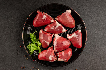 Turkey heart offal meat tasty snack fresh delicious gourmet food background on the table  rustic food top view copy space