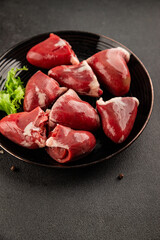 Turkey heart offal meat tasty snack fresh delicious gourmet food background on the table  rustic food top view copy space