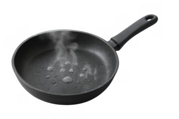 Frying pan heating with water drops sizzling and steaming, preparing for cooking, transparent background