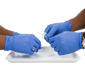 Medical team preparing butterfly needle infusion set on tray