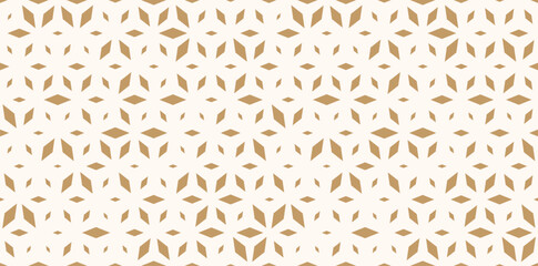 Obraz premium Golden vector seamless pattern with diamond shapes, floral silhouettes. Luxury gold background with halftone effect, randomly scattered shapes. Simple trendy festive texture. Repeated design for print