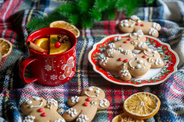 On the table there is New Year's tea 2026, coffee, gingerbread and pine cone cookies.