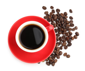 Plakat Aromatic coffee in cup and beans isolated on white, top view