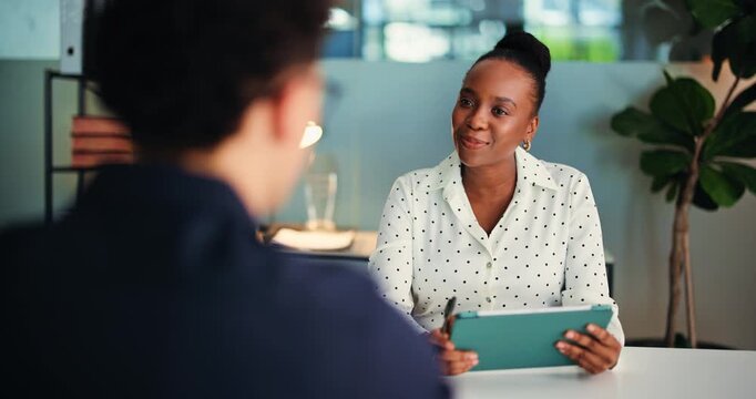 Hiring, interview and business woman with tablet in office for question, cv or onboarding. Recruitment, tech and meeting with hr advisor for job opportunity, discussion and smile with candidate
