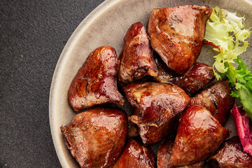 Heart turkey roasted offal poultry meat tasty snack fresh delicious gourmet food table background rustic food top view copy space